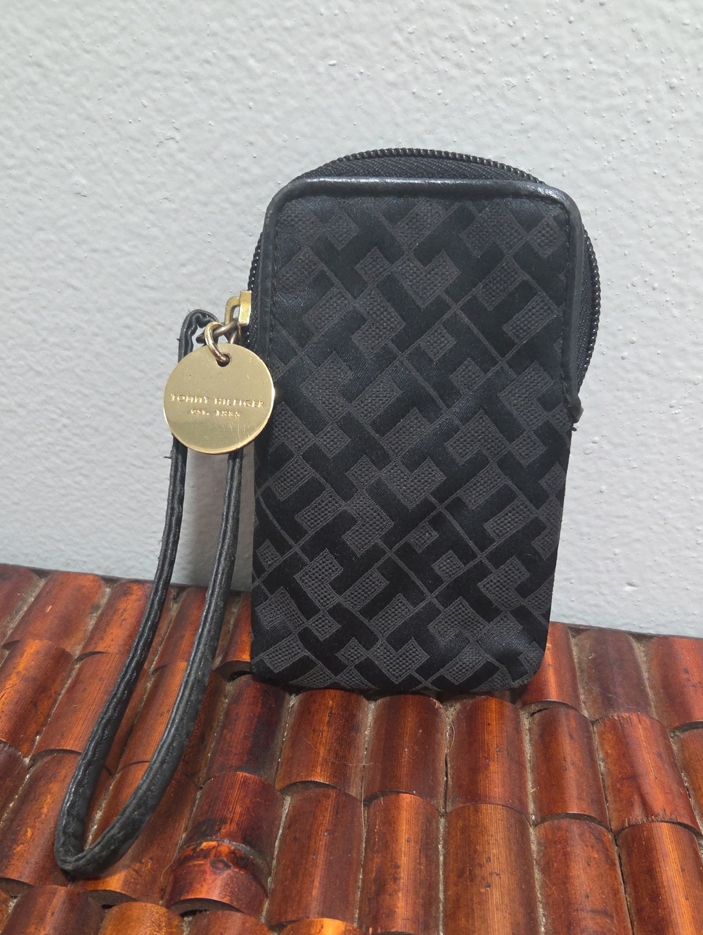 Tommy Hilfiger Black Signature Pattern Wristlet Pouch with Gold Charm